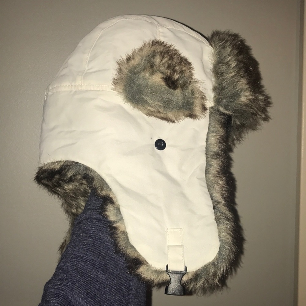 White and faux fur winter hat